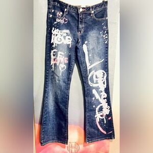 Denim Zana Di Jeans with pink & white graffiti style writings on front & back